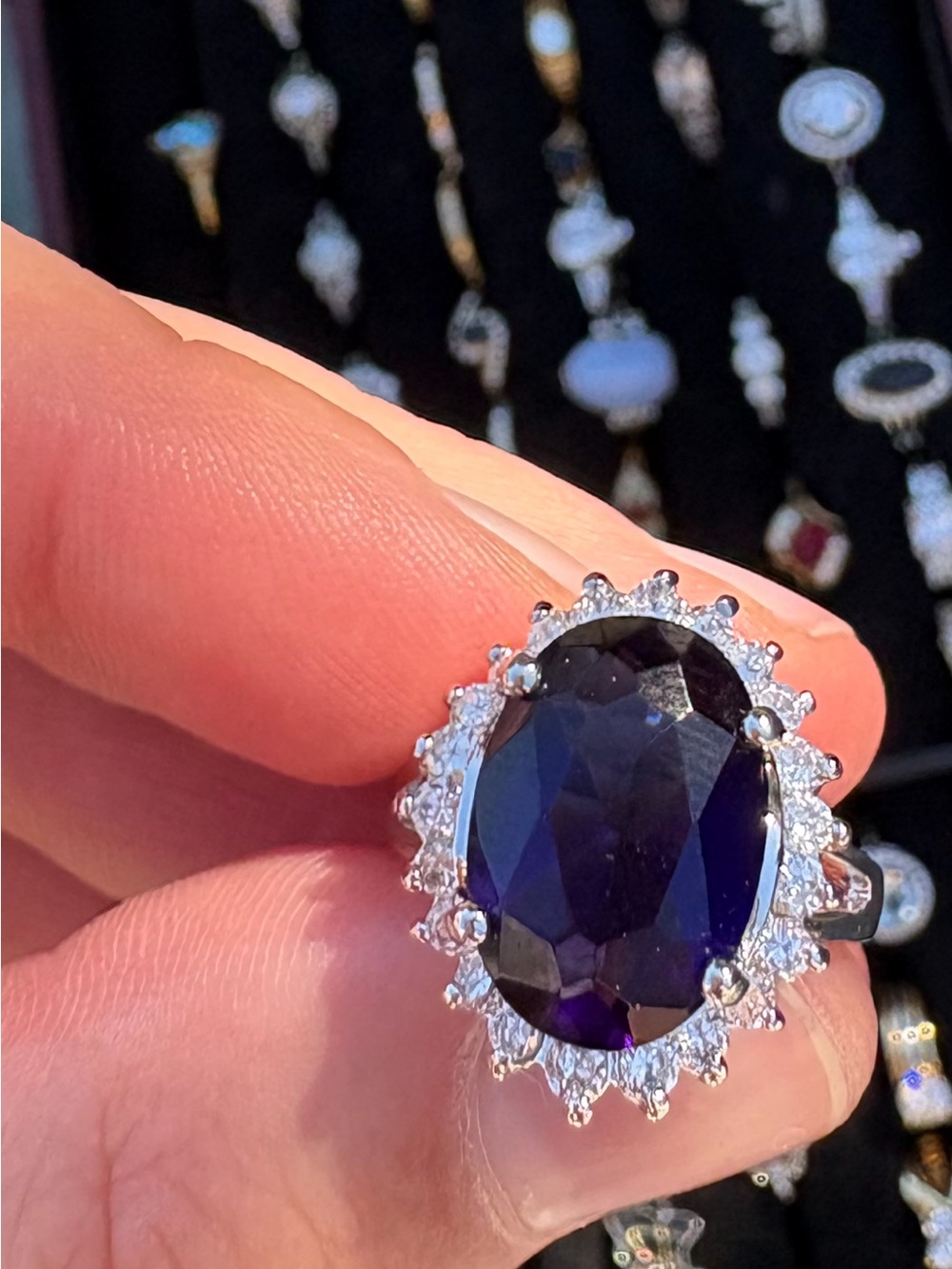 Vintage Avon Elegant Sterling Silver Ring with Deep Blue Oval Stone and Halo